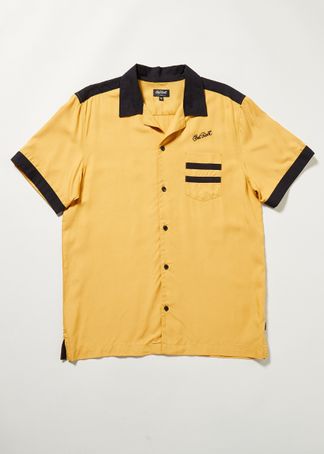 Chet rock Triumph shirt in mustard